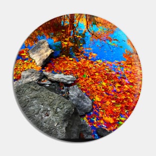 Brilliant fall foliage reflecting on calm water Pin