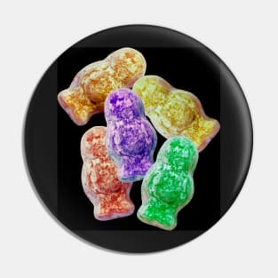 Jelly babies sweets on a black background. Pin