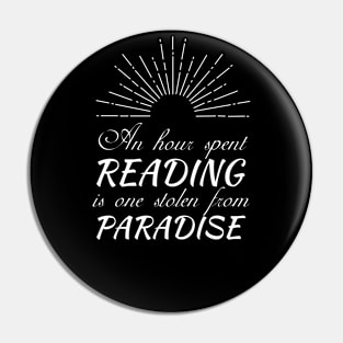 An hour spent reading is one stolen from paradise Pin