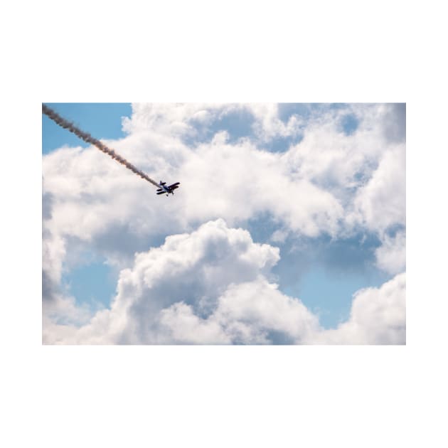 Biplane Flying into the Clouds by jonrendle