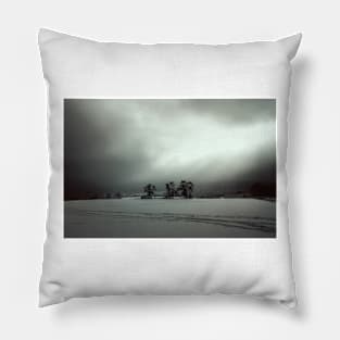 Sun over a snowy landscape Pillow