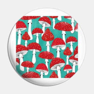 Red mushrooms on turquoise blue Pin