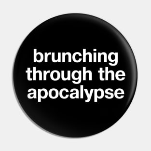 "brunching through the apocalypse" in plain white letters - just live in denial Pin