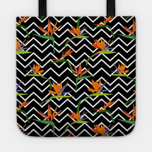 Exotic tropical Strelitzia flower on striped zigzag black and white background Tote