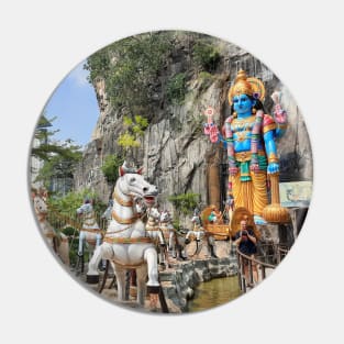 Hindu statue on horse carriage at Ramayana Cave Pin