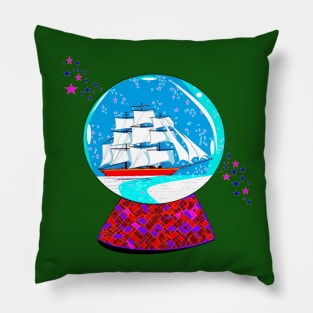 A Snow Globe with Clipper Ship Pillow