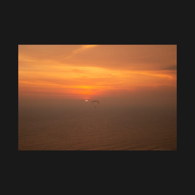 Bright golden sunset over the sea with one paraglider by kall3bu