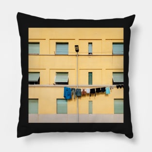 Laundry Drying on Washing Line Against Yellow Building Facade in Italy Pillow