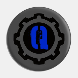 Blue Letter Q in a Black Industrial Cog Pin