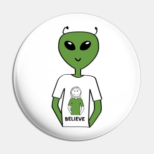 "Believe" T-shirt with Alien Wearing a T-shirt with a Human  (Girl) Pin