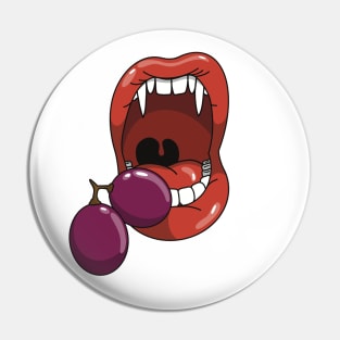 Mouth with vampire teeth about to take a bite into a purple grape Pin