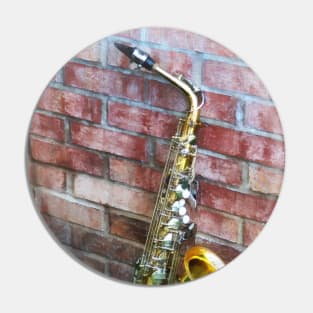 Music - Saxophone Against Brick Pin