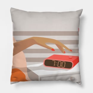 Womans hand pushing on alarm clock snooze button Pillow