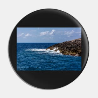 Waves beating against the rocks Pin