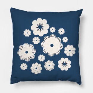 Beige flowers on a dark blue Pillow