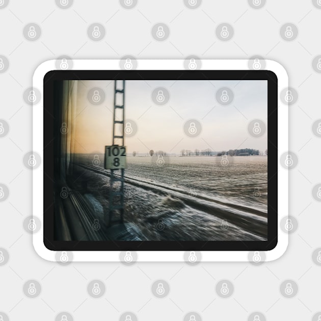 Frosty Winter Landscape Shot Through Train Window Magnet by visualspectrum