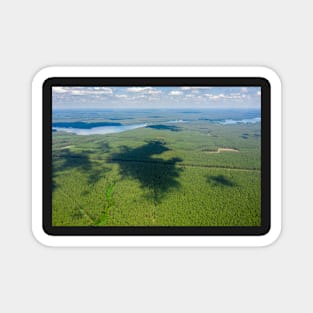 Aerial view of large forest area and distant lake Biale Augustowskie Magnet