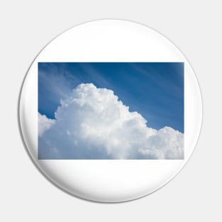 Rising storm cloud and blue sky Pin