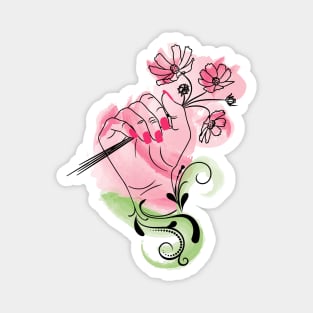 Female hand hold flowers Magnet