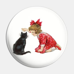 Little girl playing with black cat at Christmas Pin