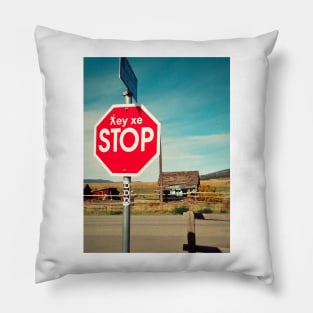 Bilingual stop sign in English and First Nations language near Merritt, BC, Canada. Pillow