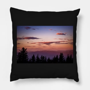 Clouds over mountains at sunset Pillow