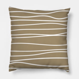 Drawing White Lines Across Tan Pillow