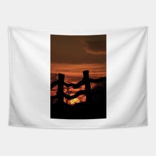 Wooden Fence with a colorful Kansas Sunset Tapestry