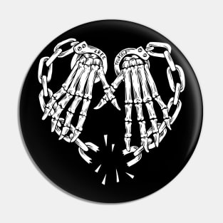 Skull hands and broken heart-shaped chains for Halloween Pin