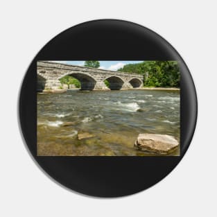 The flowing waters and the bridge Pin