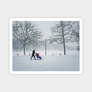 mom walks her baby in the snow Magnet