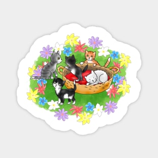 funny cartoon kittens in a basket on a background of flowers Magnet