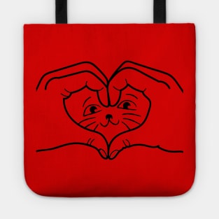 hands in the shape of a heart and a cat Tote