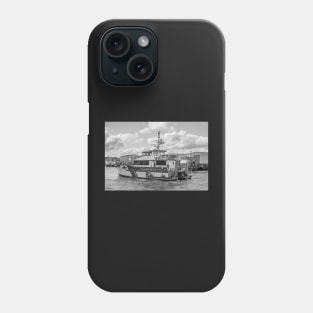 Crew transfer vessel motoring towards the sea in Great Yarmouth, Norfolk Phone Case