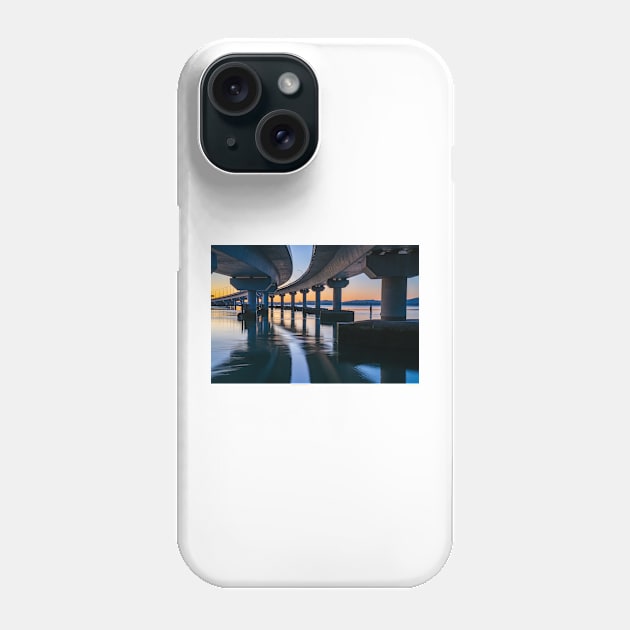 Curving lines and calm water under Tauranga Harbour Bridge at sunrise. Phone Case by brians101