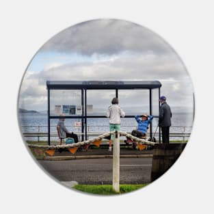 People chatting around a bus shelter - Lochranza, Scotland Pin