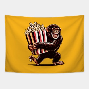 Happy chimpanzee with a packet of popcorn Tapestry