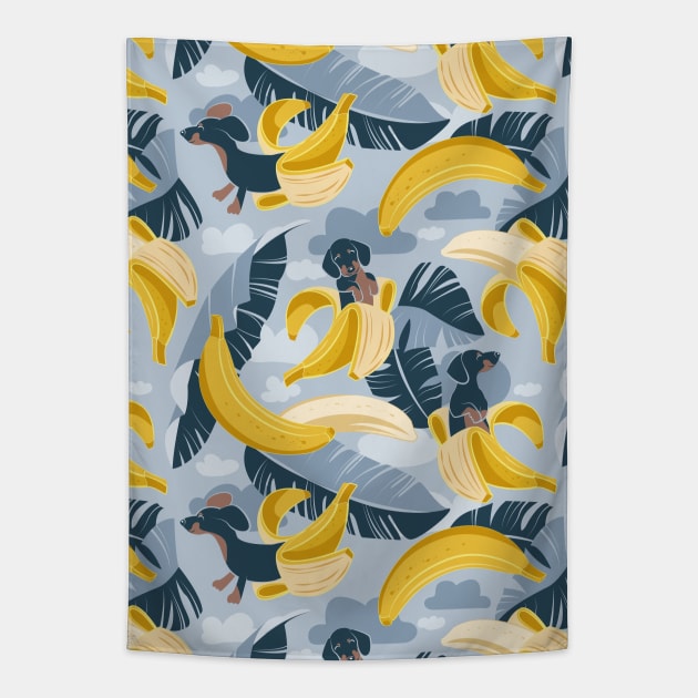 Surrealistic tropical Dachshund bananas // pattern // pastel blue background navy blue dogs and banana fruit leaves Tapestry by SelmaCardoso