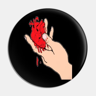 Heart in hand Pin