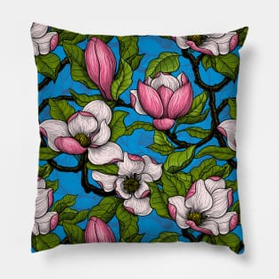 Blooming magnolia on blue Pillow