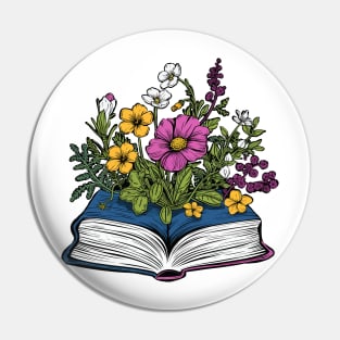 Flowers growing from book Pin