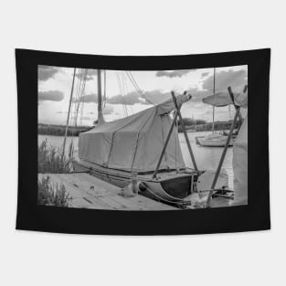 Traditional wooden sailing boat moored on the River Thurne, Norfolk Tapestry