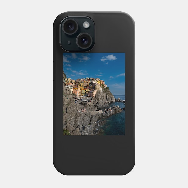 View on the cliff town of Manarola, one of the colorful Cinque Terre on the Italian west coast Phone Case by Dolfilms