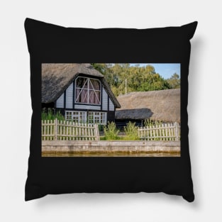 Traditional riverside cottage with thatched roof Pillow