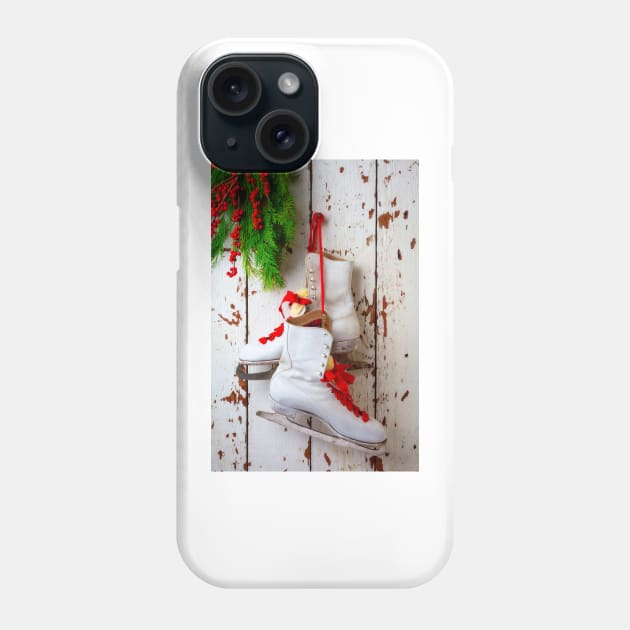 Ice Skates Hanging On White Wall Phone Case by photogarry