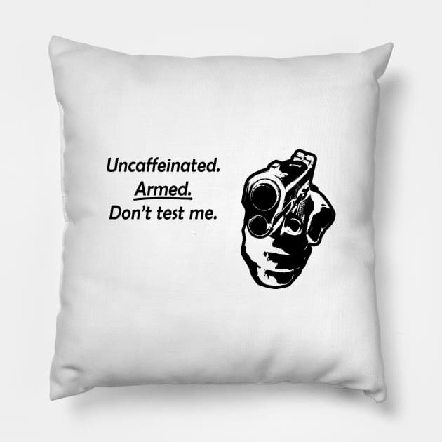 Uncaffeinated. Armed. Don't test me. Pillow by Taversia