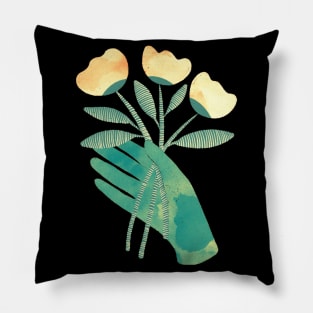 Green hand with yellow flowers for you on black background Pillow