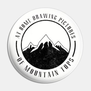 At home drawing pictures, of mountain tops Pin