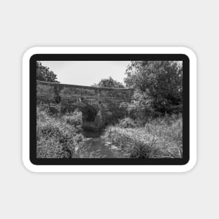 Brick bridge over the river Magnet