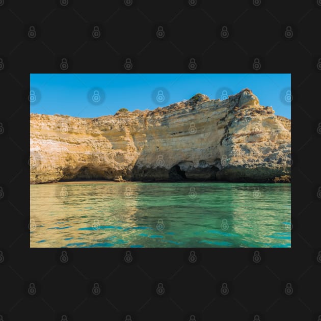 Scenic golden cliffs near Alvor, Portimao, Algarve by AnaMOMarques
